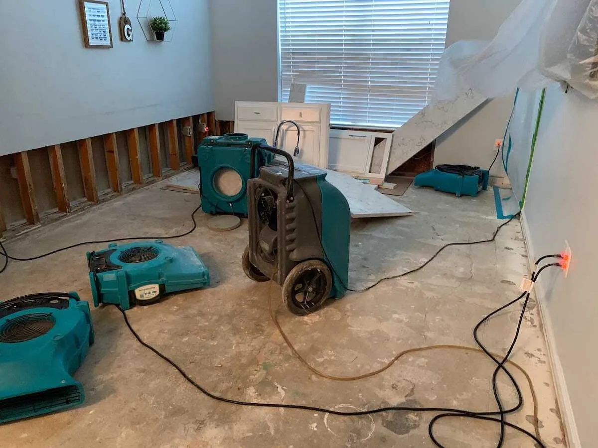 Dehumidifier in flood-cut room for Water Damage Restoration in Valrico